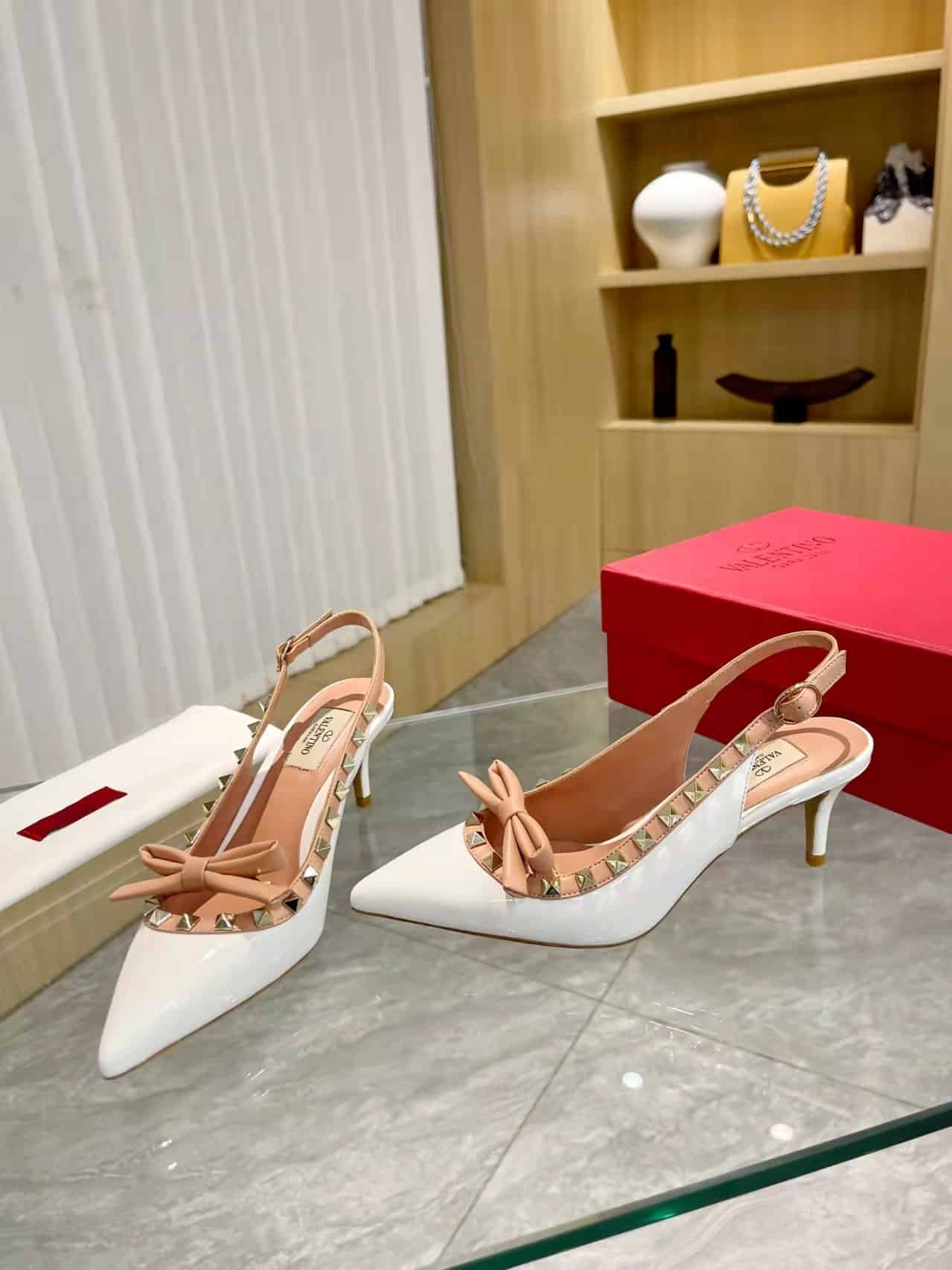 Va1e*ntin0 Rockstud Bow Slingback Pump In Patent Leather With Matching Studs White