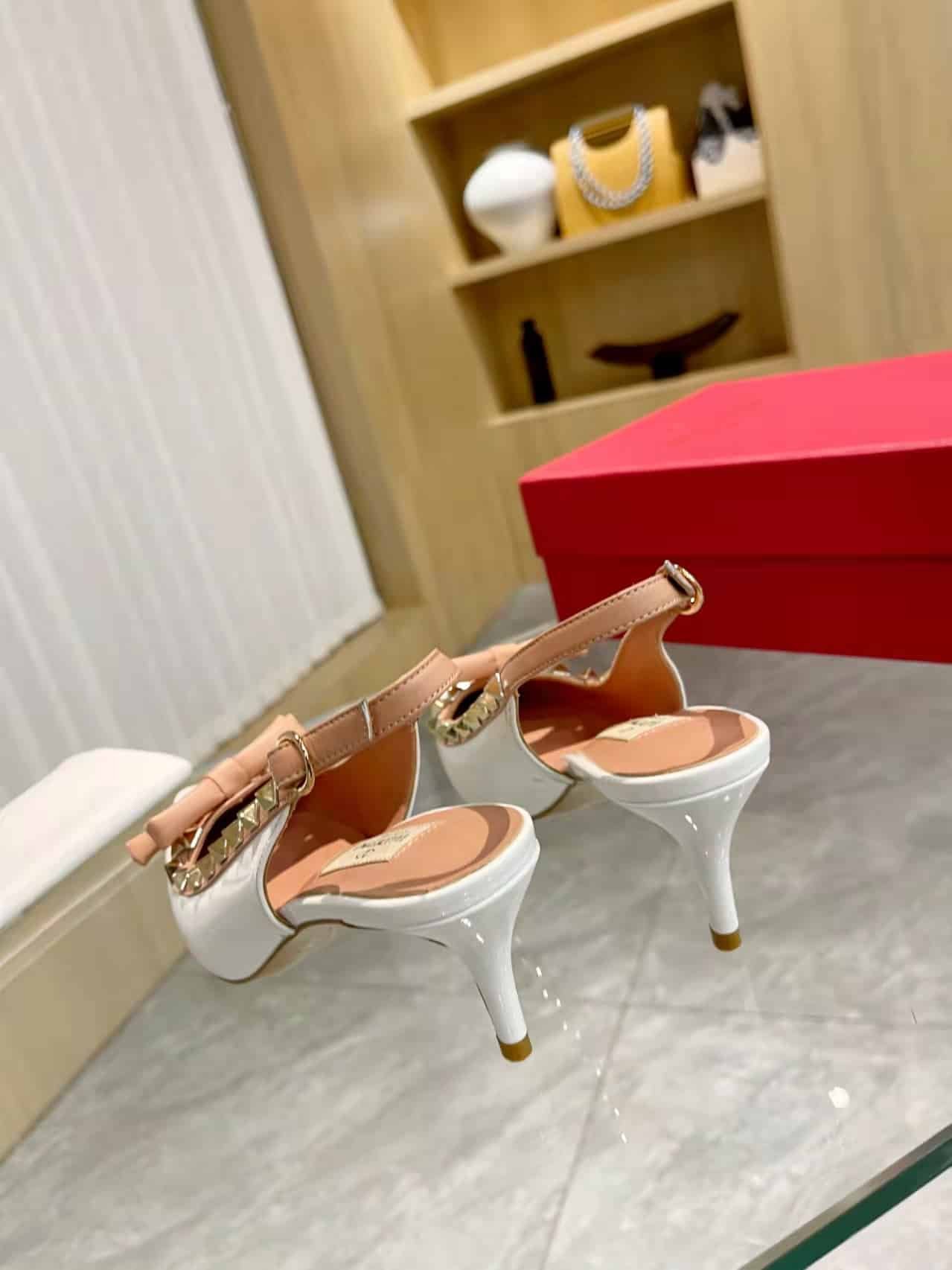 Va1e*ntin0 Rockstud Bow Slingback Pump In Patent Leather With Matching Studs White