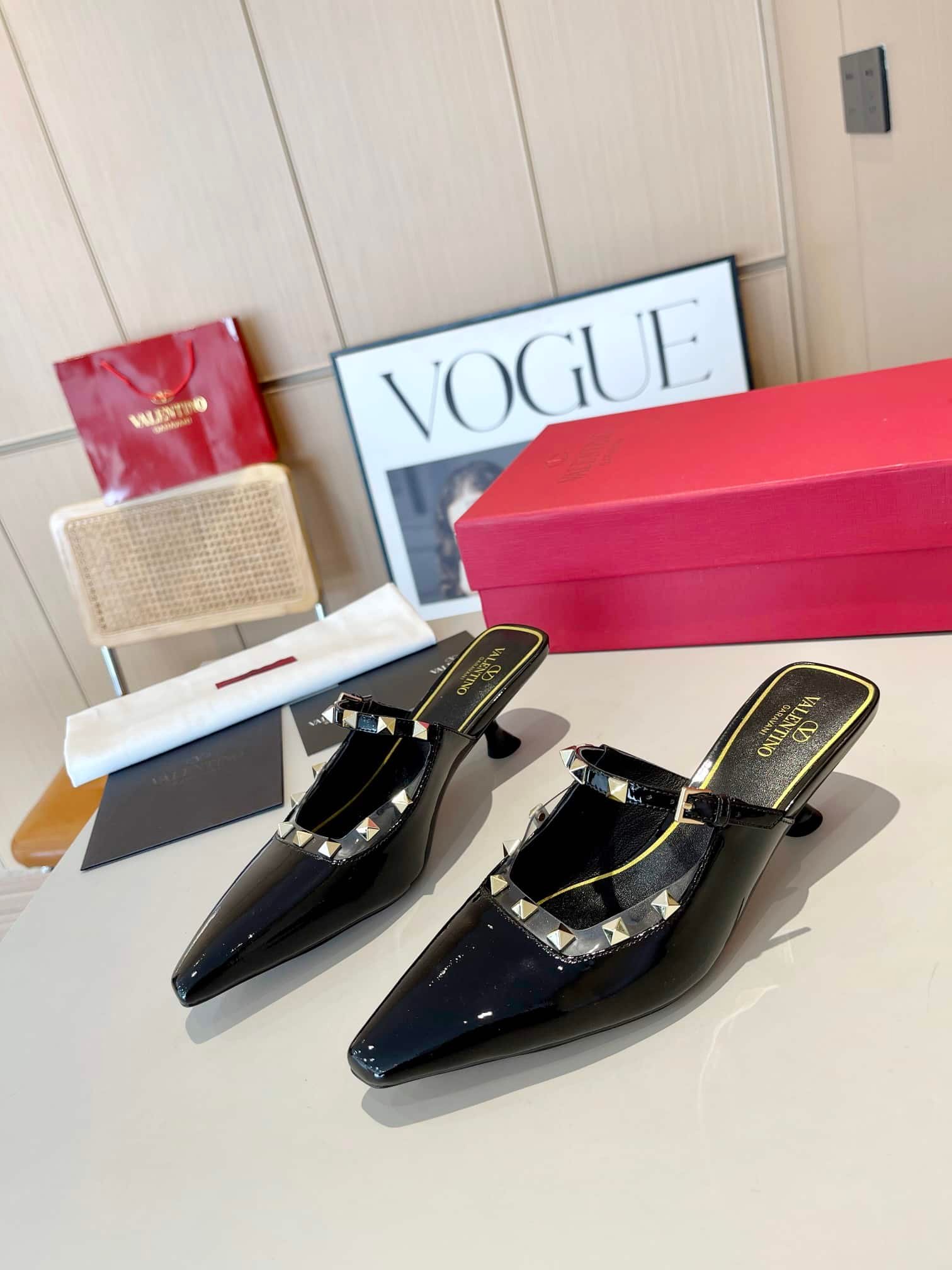 Va1e*ntin0 Garavani Rockstud Asymmetric Patent Leather Mules Black