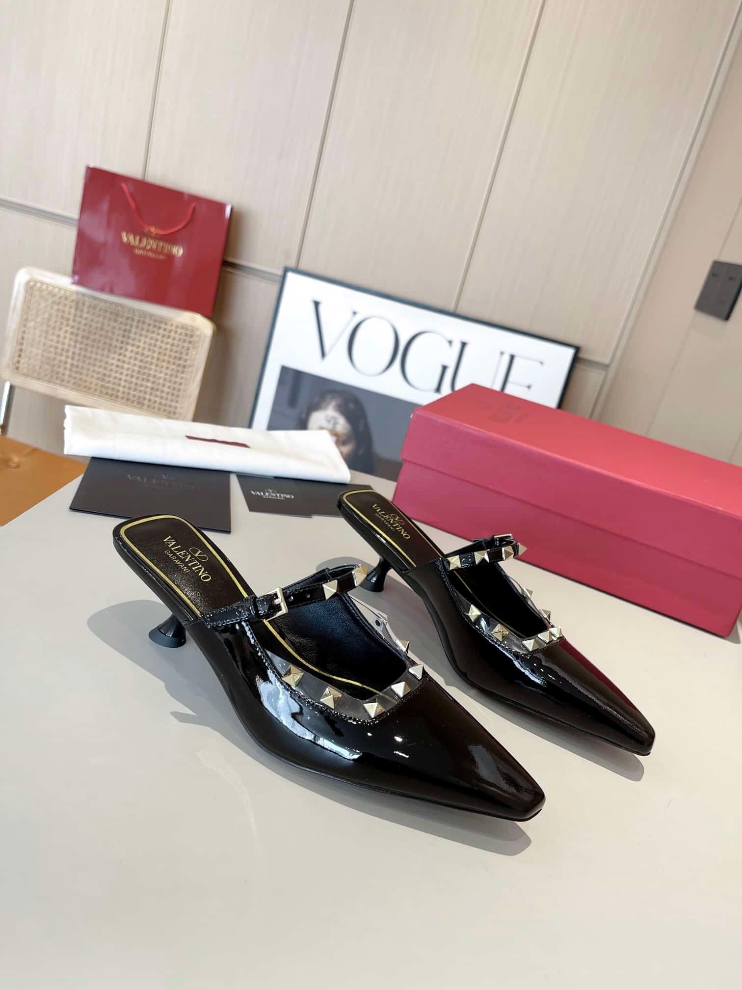 Va1e*ntin0 Garavani Rockstud Asymmetric Patent Leather Mules Black