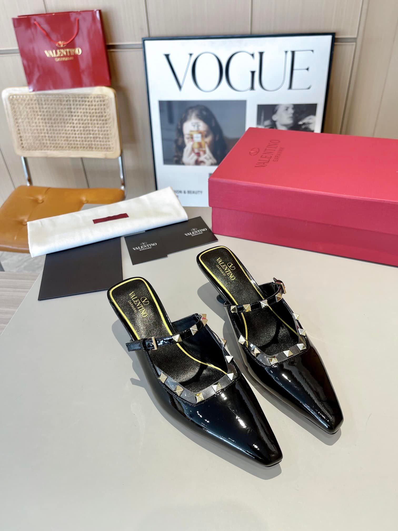 Va1e*ntin0 Garavani Rockstud Asymmetric Patent Leather Mules Black