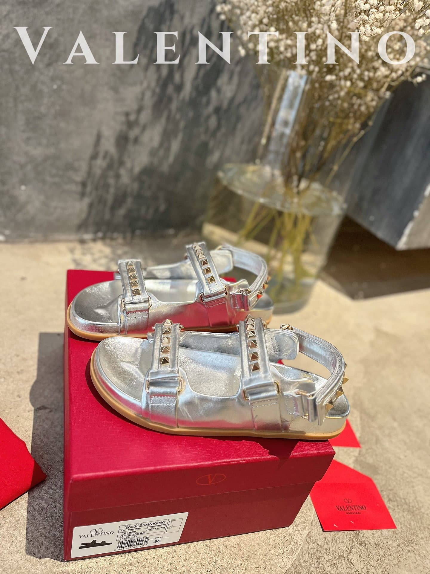 Va1e*ntin0 Garavani Rockstud Flat Sandal In Nappa Leather For Woman In Silver