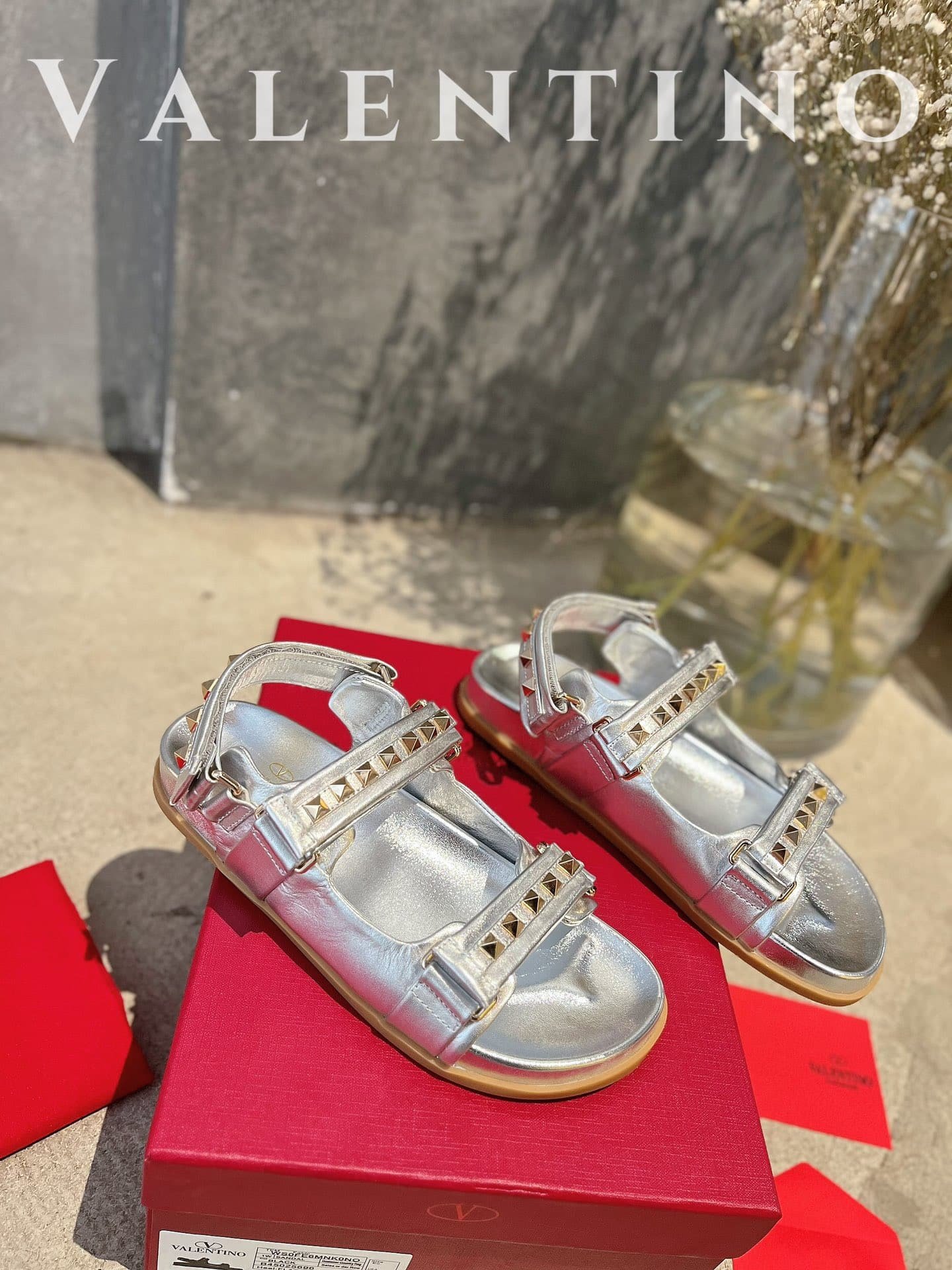 Va1e*ntin0 Garavani Rockstud Flat Sandal In Nappa Leather For Woman In Silver
