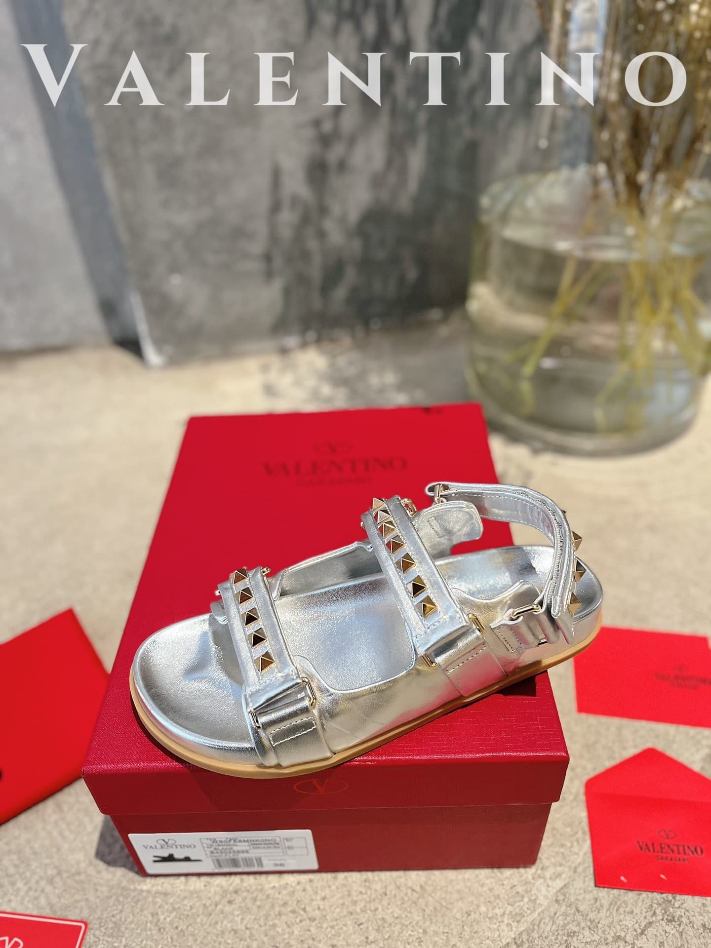 Va1e*ntin0 Garavani Rockstud Flat Sandal In Nappa Leather For Woman In Silver