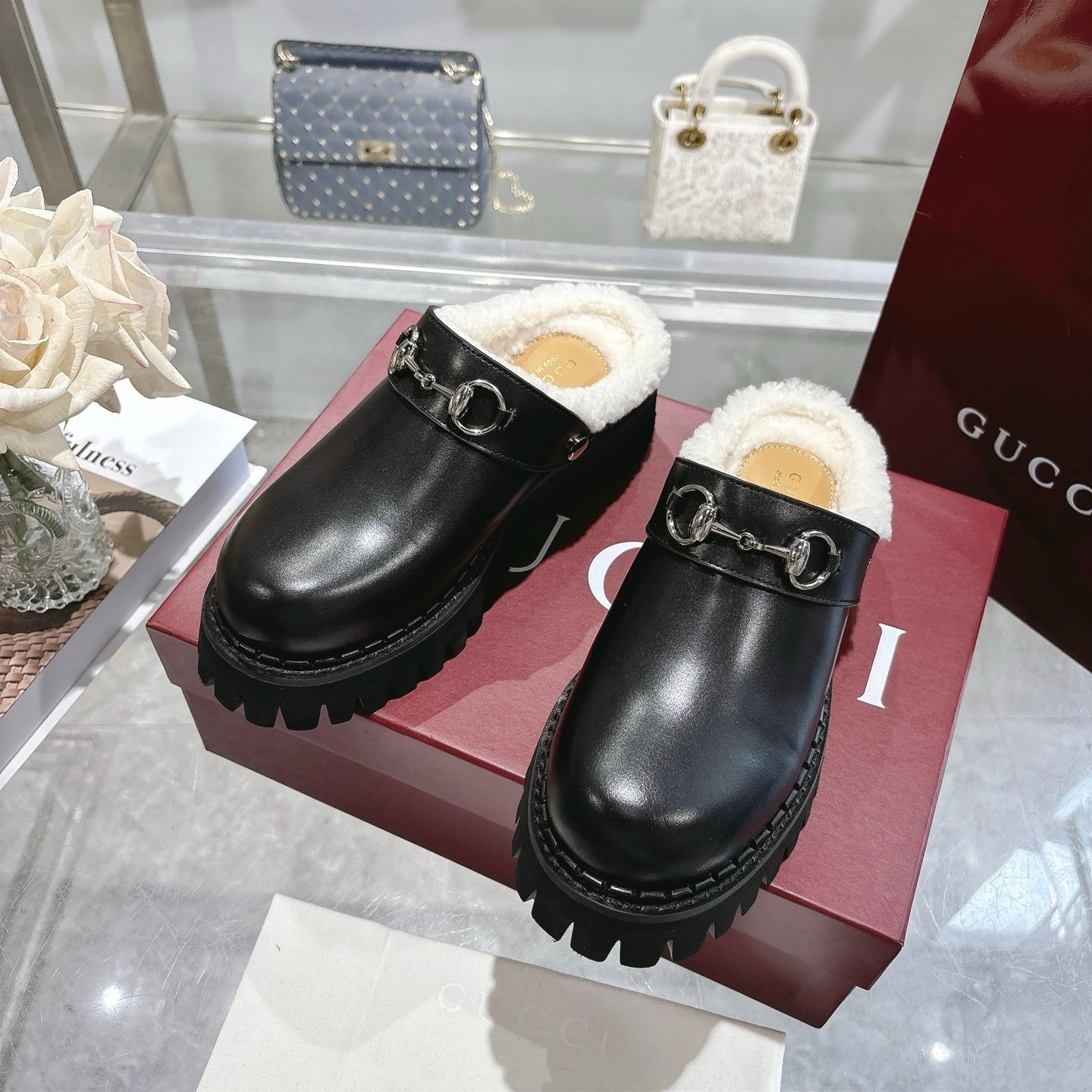Gvc*1 Horsebit Shearling Mules In Black Leather
