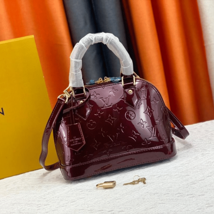 L0vis Vvtt0n Alma BB Monogram Vernis Leather Dark Red 23Cm