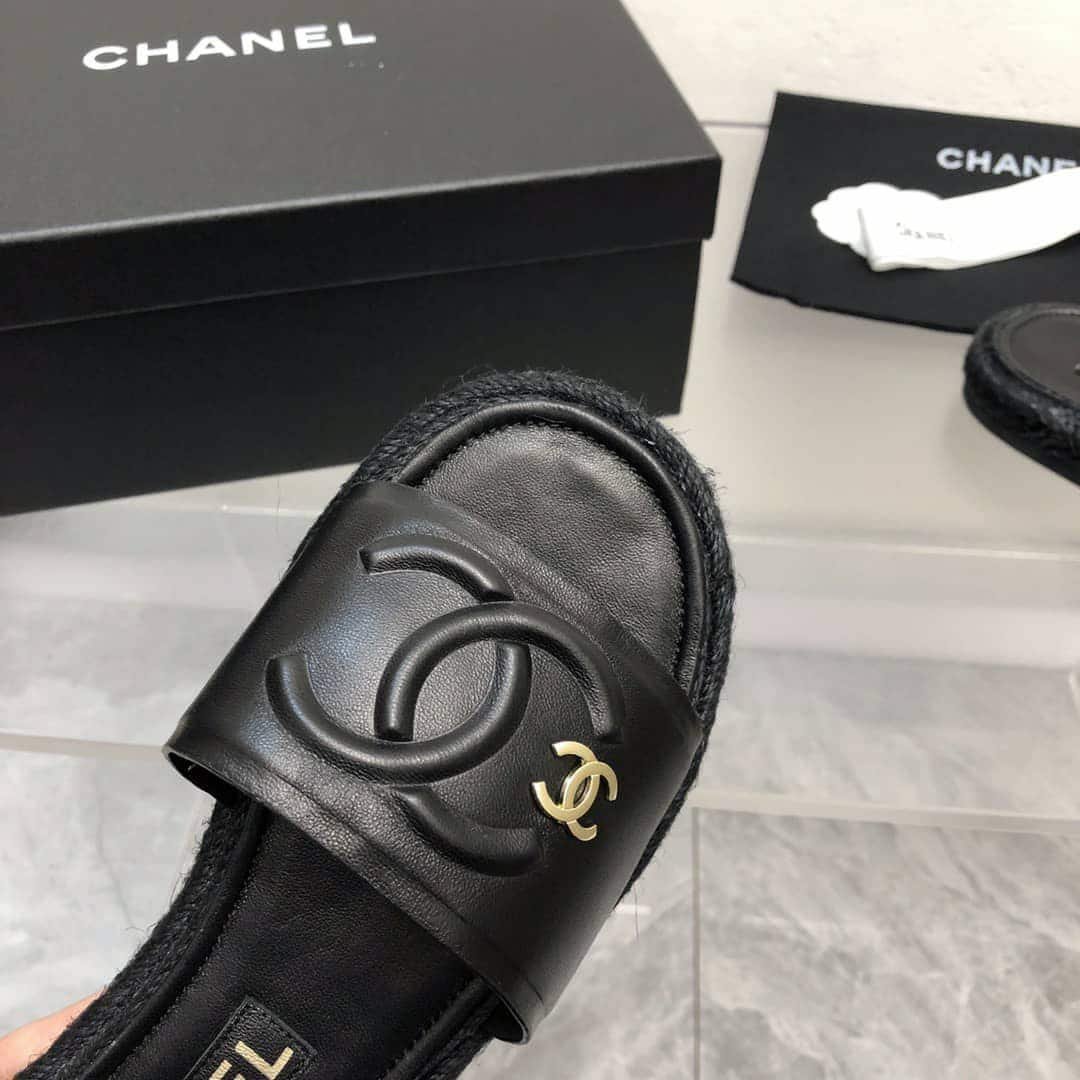 Ch**el Black Slide Cc Logo